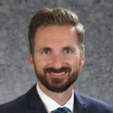 Headshot of Casey Sayre