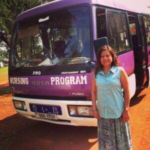Purple bus with “Nursing Program” written on front