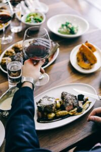 Person eating at a steakhouse
