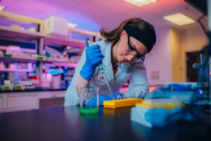 Roseman University student working in a lab
