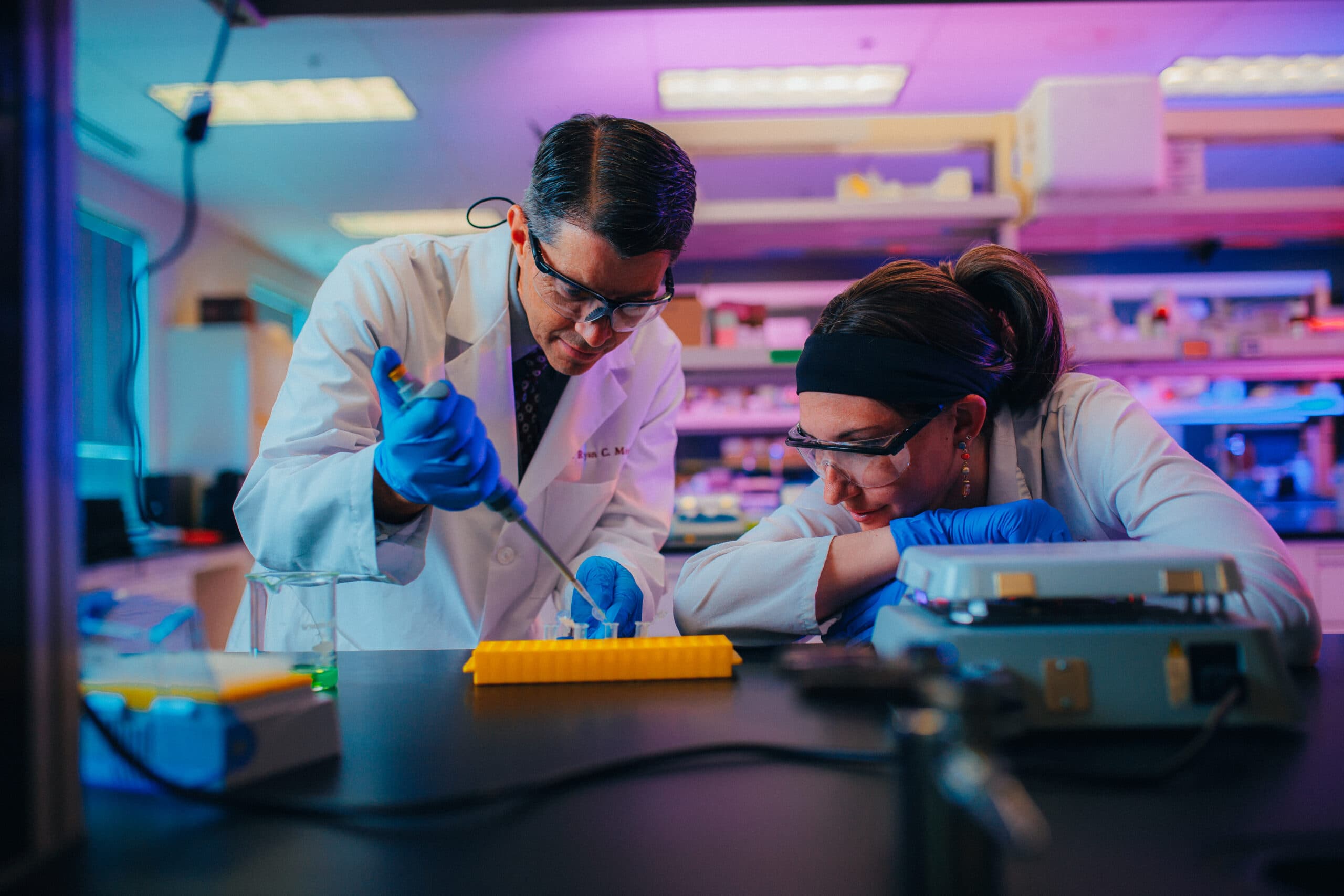 Roseman University students working in a lab