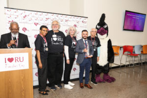 Dr. Toma with the Alumni Trailblazer Award