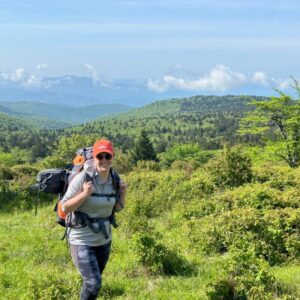 Dr. Kimberly Veltman smiles for a picture while hiking the Appalachian Trail.