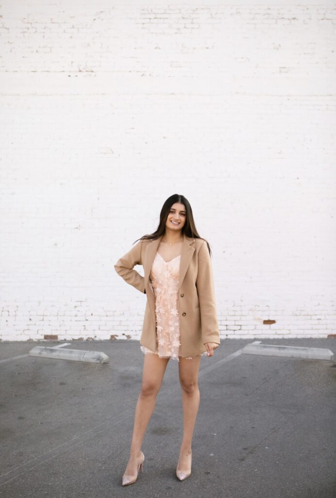 dnpna student in dress and heals