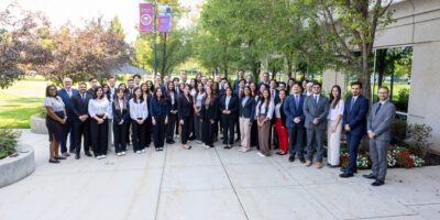 graduate students smiling