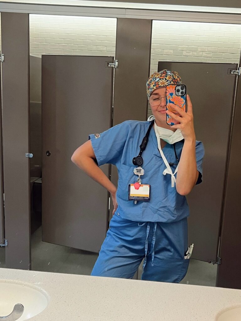 dnpna student in blue scrubs selfie
