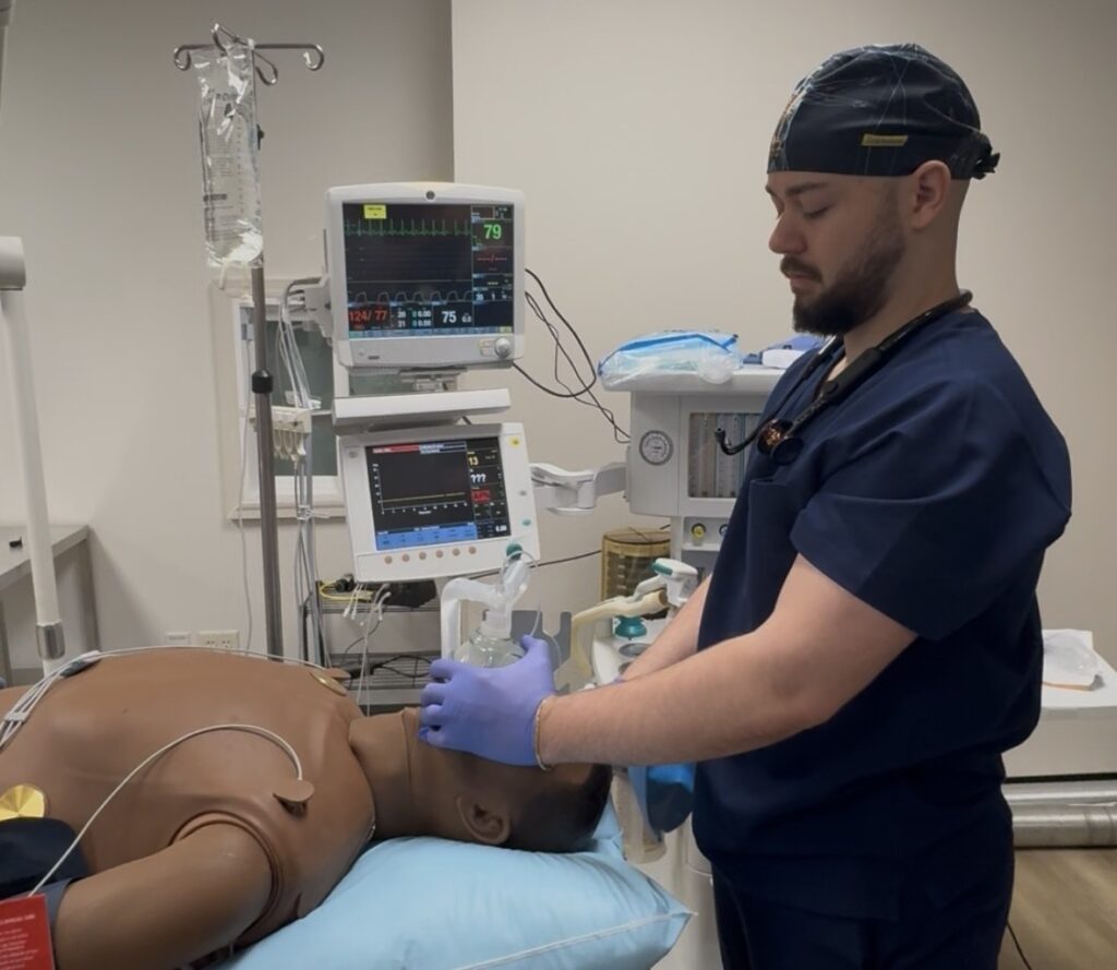 dnpna student working on manikin