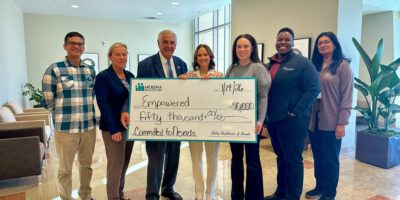 Kimberly Gahagan, AVP for Growth & Community Engagement for Molina Healthcare of Nevada is joined by Roseman University College of Medicine and EMPOWERED for a check presentation at Roseman's Summerlin Campus.