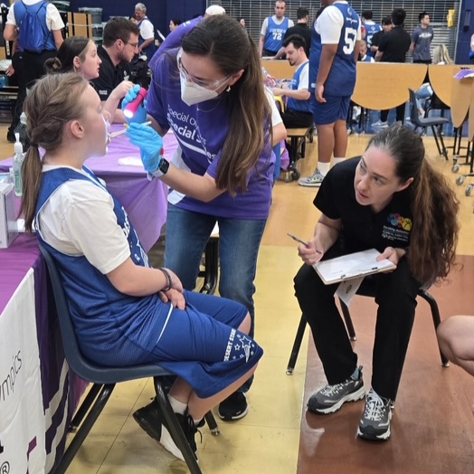 Faculty and students provide oral health screenings for Special Olympics athletes participating in the Southern Nevada Basketball Regional.